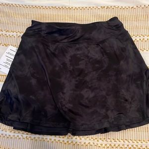 Muted black tye dye skirt with shorts underneath